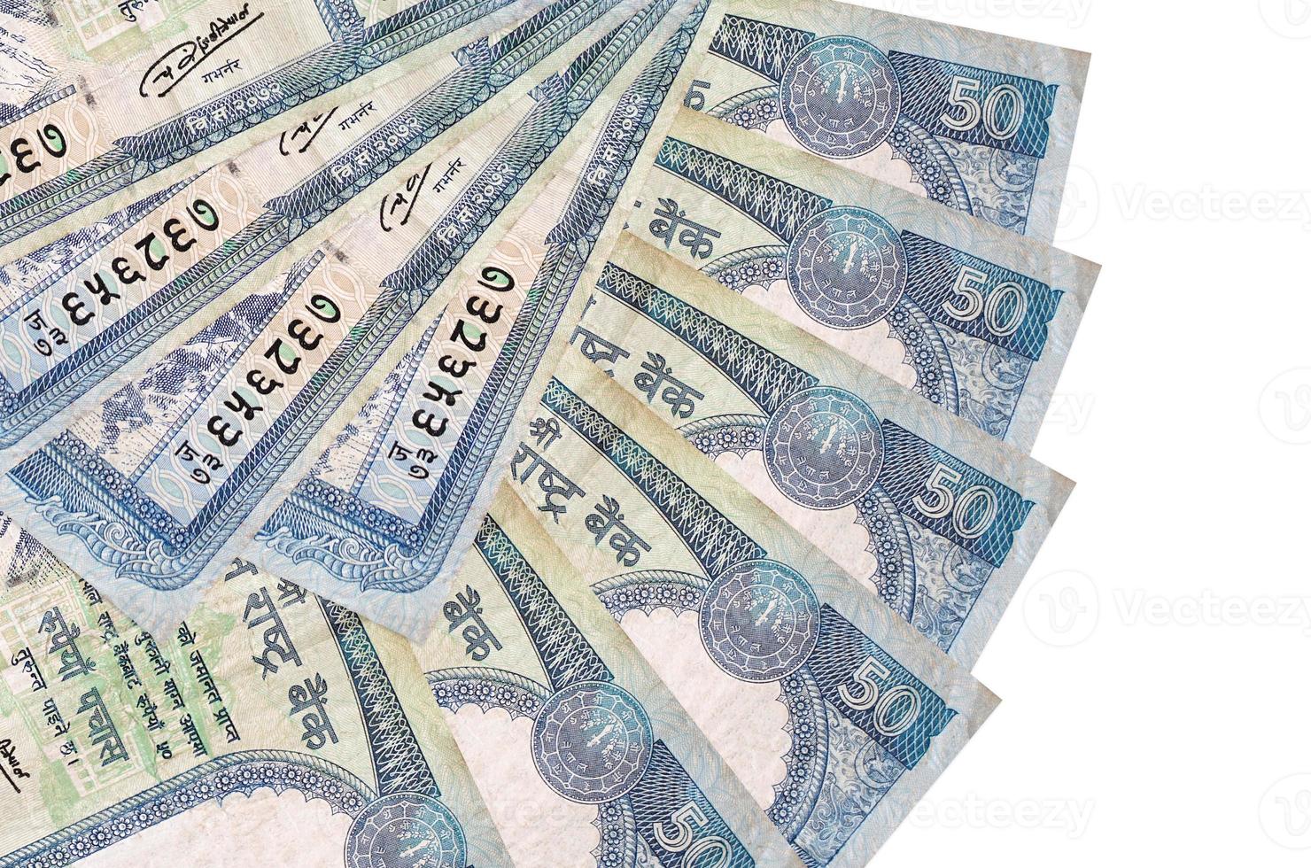 50 Nepalese rupees bills lies isolated on white background with copy space stacked in fan shape close up photo