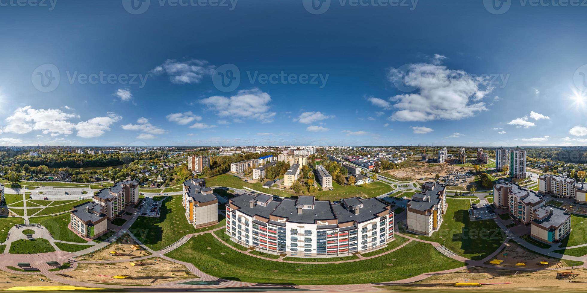 aerial full seamless spherical hdri 360 panorama view above great height in courtyard of modern multi-storey multi-apartment residential complex of urban development in equirectangular projection. photo