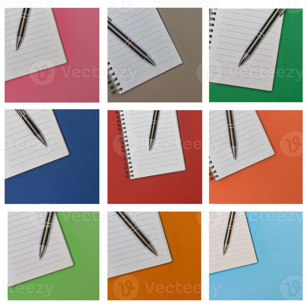 Various notebooks with pen on blank page photo