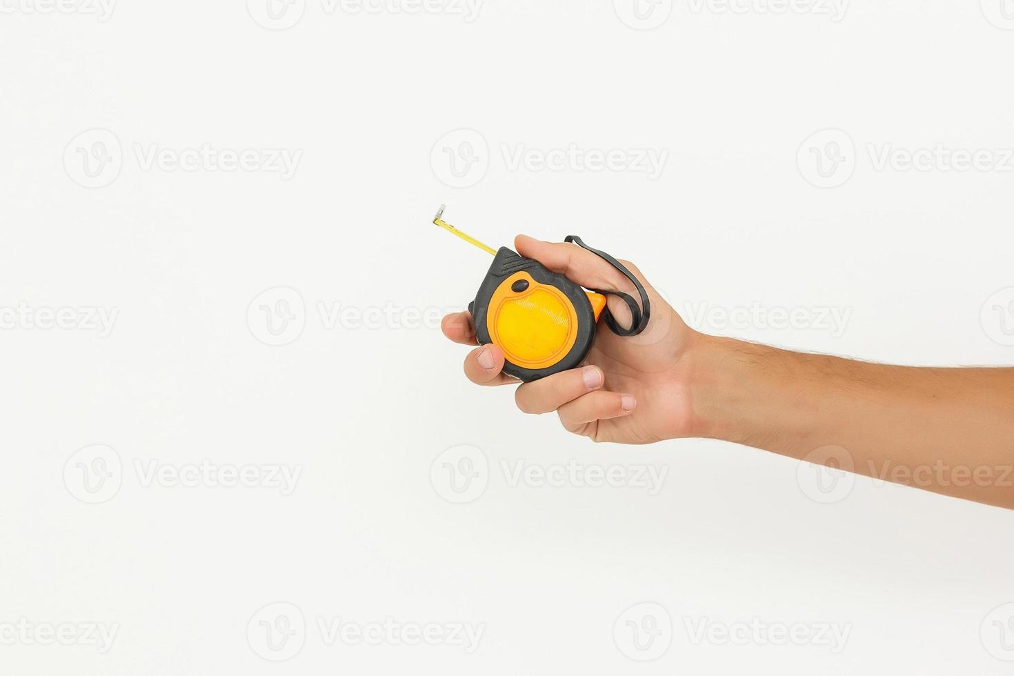 human hand with tape-measure isolated on white photo