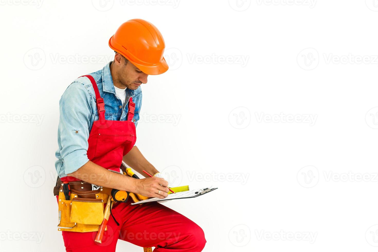 Construction Worker Contractor Carpenter with Clipboard on White photo