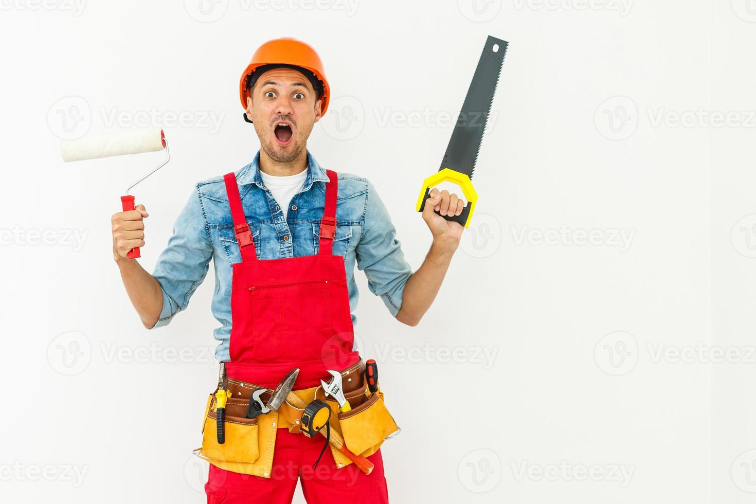 Young construction workers with hard hats on a white background photo