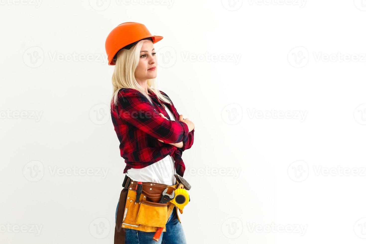 girl with construction tools hat photo