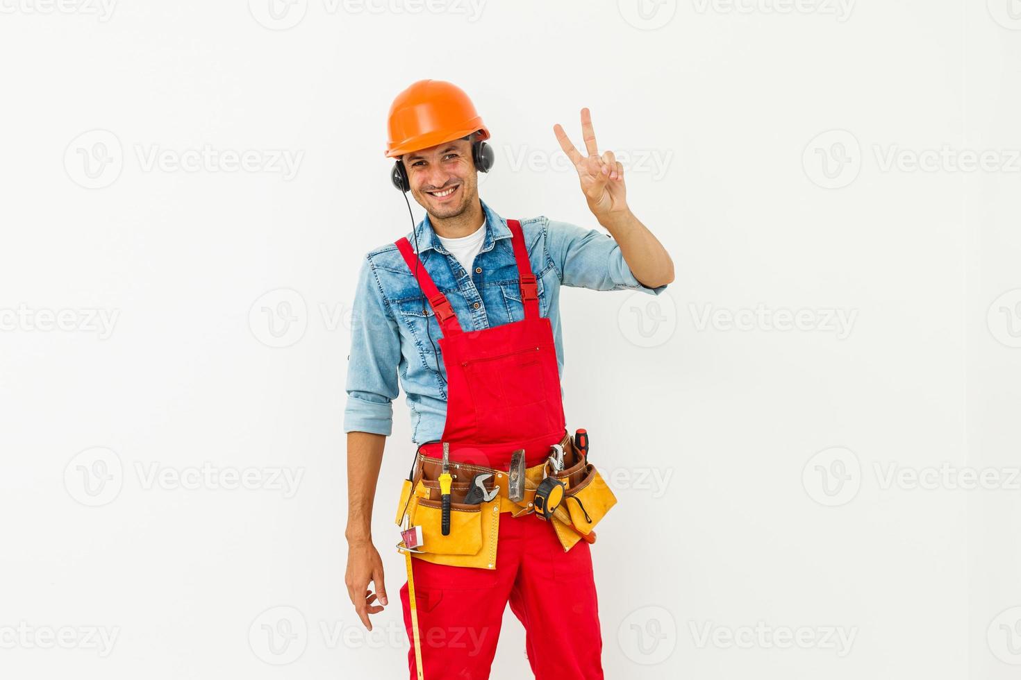 Male worker with headphones over white background. photo