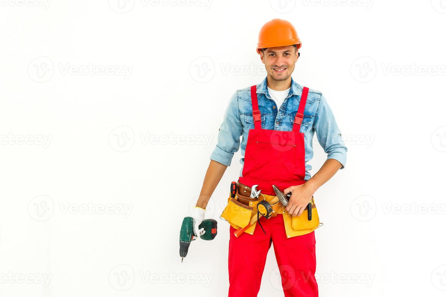 Stock image of male construction worker over white background photo