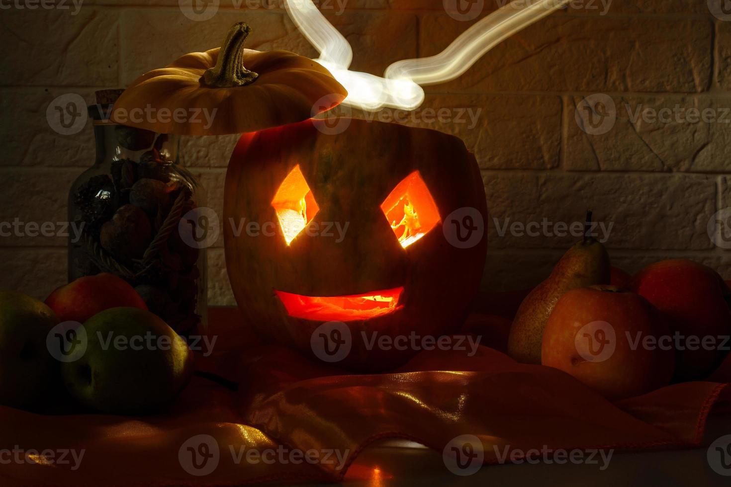 pumpkin head on a brick wall background photo