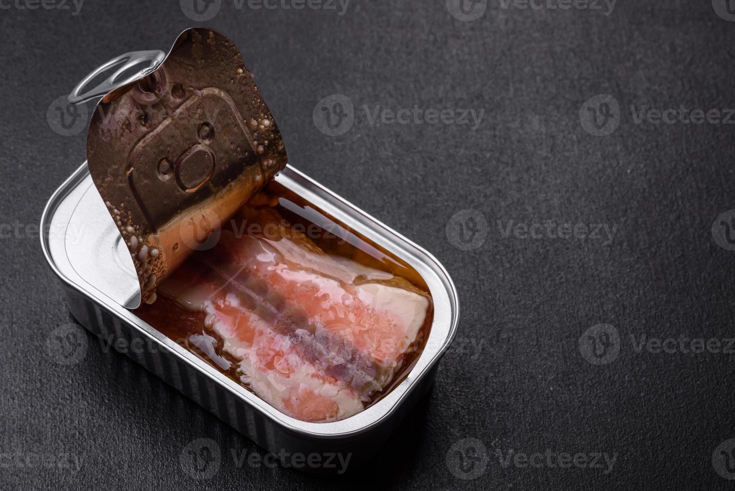 Tin or aluminum rectangular can of canned salmon with a key photo