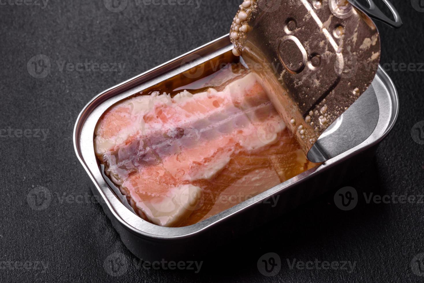 Tin or aluminum rectangular can of canned salmon with a key photo