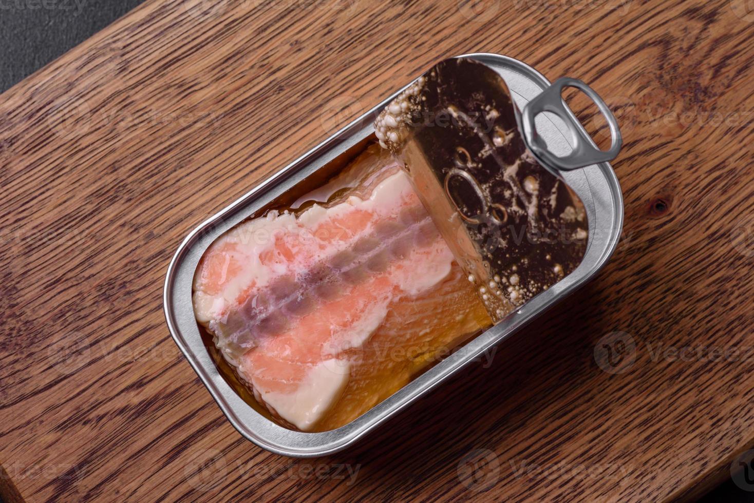 Tin or aluminum rectangular can of canned salmon with a key photo