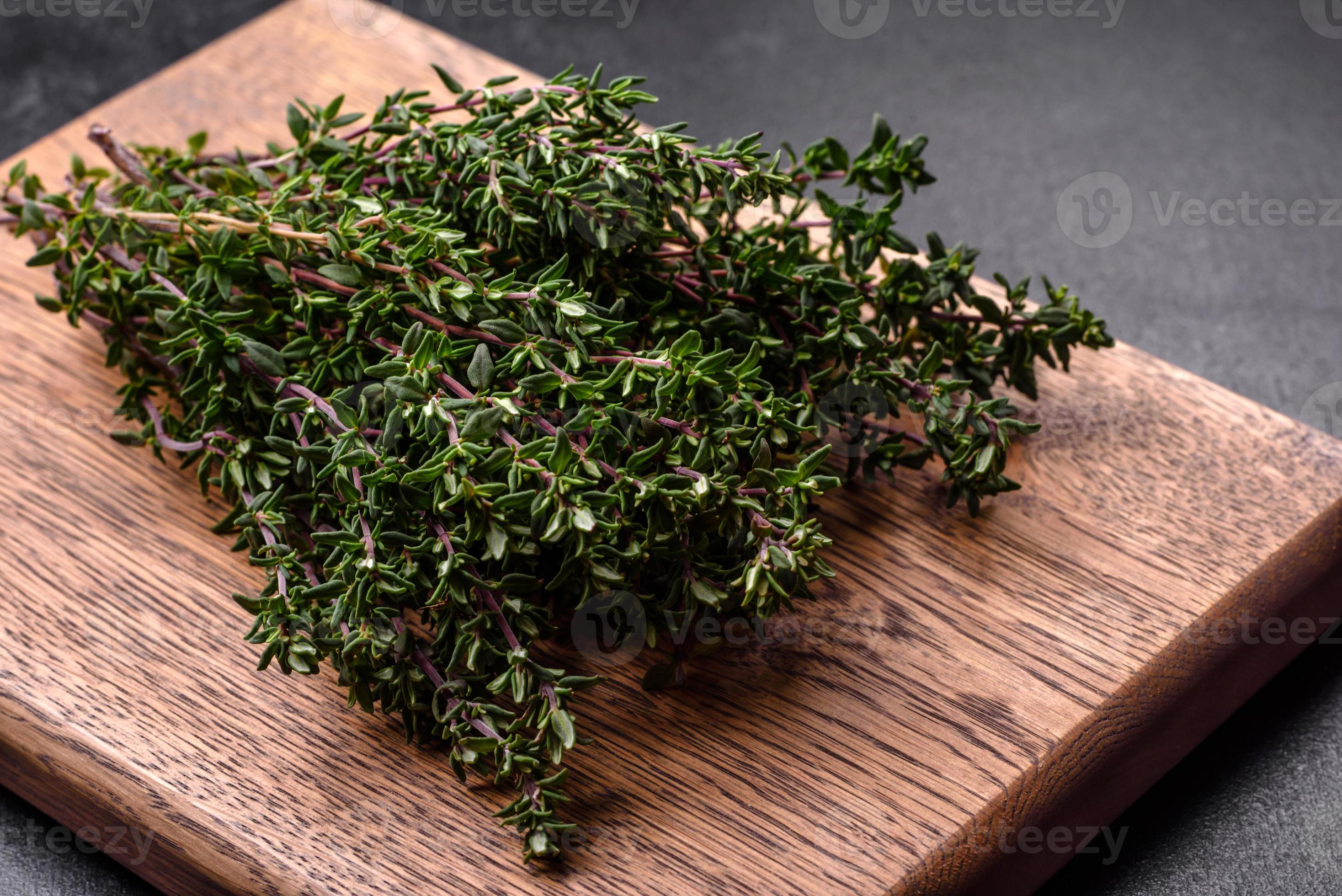 Bunch of fresh picked thyme on a dark concrete background 17027884