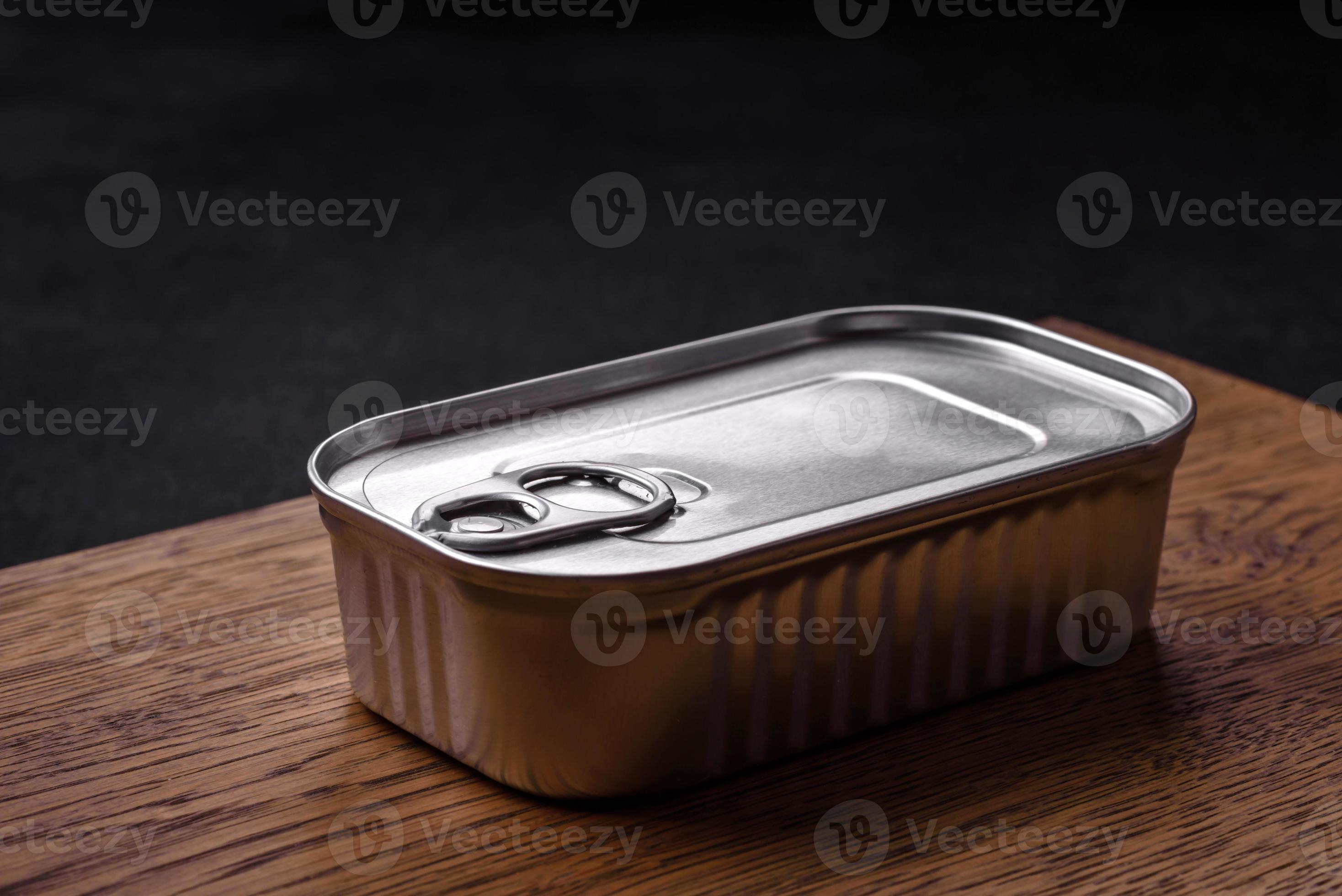 Tin or aluminum rectangular can of canned food with a key 17027891