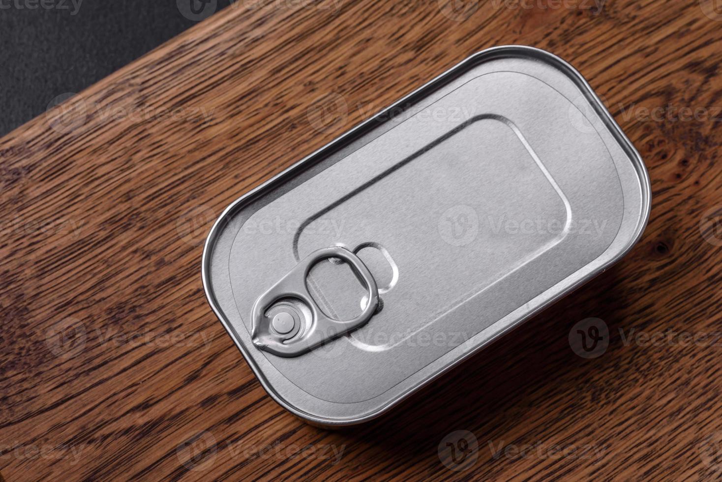 Tin or aluminum rectangular can of canned food with a key photo