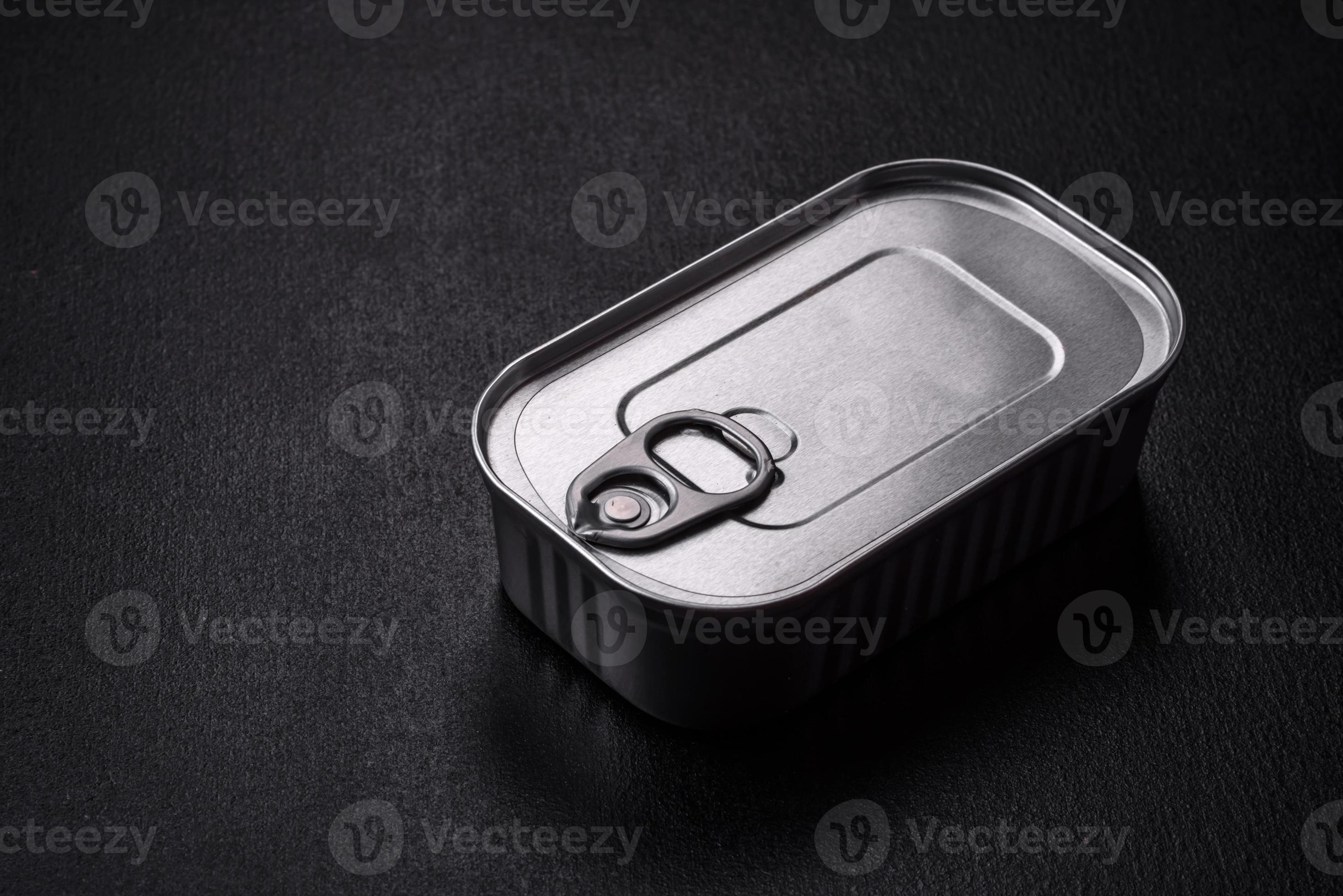 Tin or aluminum rectangular can of canned food with a key 17027898