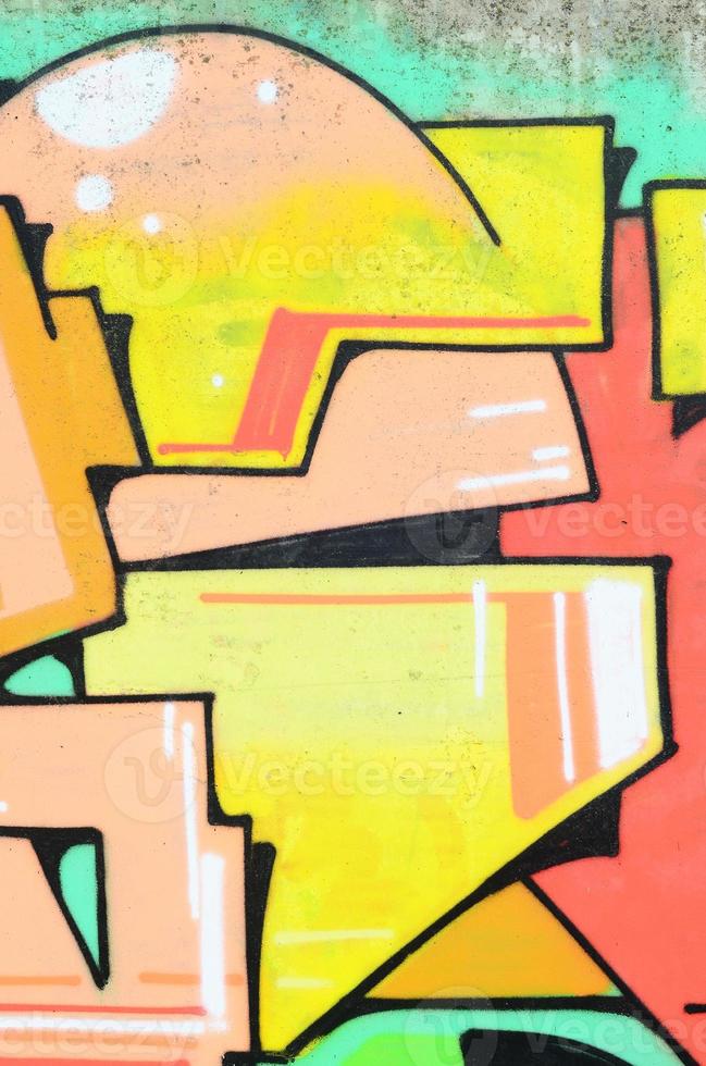 Background image with a colored graffiti pattern, which is applied to the concrete wall with aerosol paints. A lot of contours and fragments filled with paint, forming an interesting composition photo