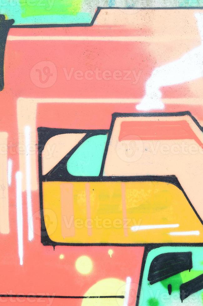 Background image with a colored graffiti pattern, which is applied to the concrete wall with aerosol paints. A lot of contours and fragments filled with paint, forming an interesting composition photo