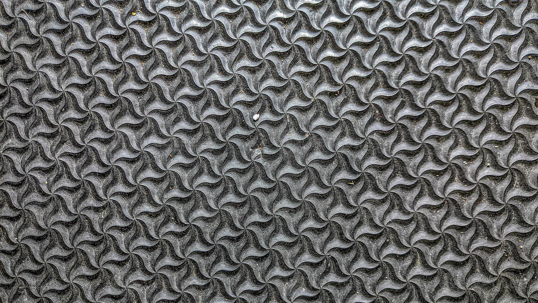 Patterned mat rug texture, patterned rug background. photo