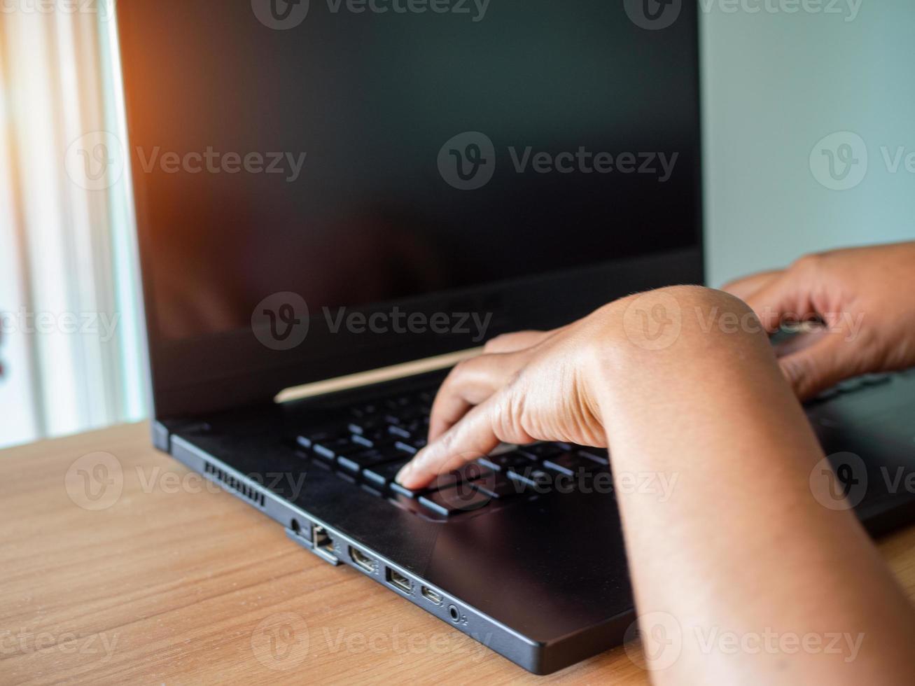 Human hand working on computer. business concept and communication technology photo