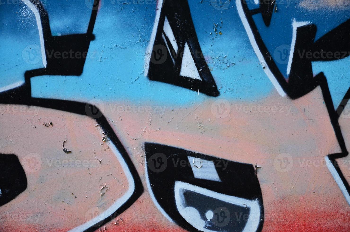 The old wall, painted in color graffiti drawing with aerosol paints. Background image on the theme of drawing graffiti and street art photo