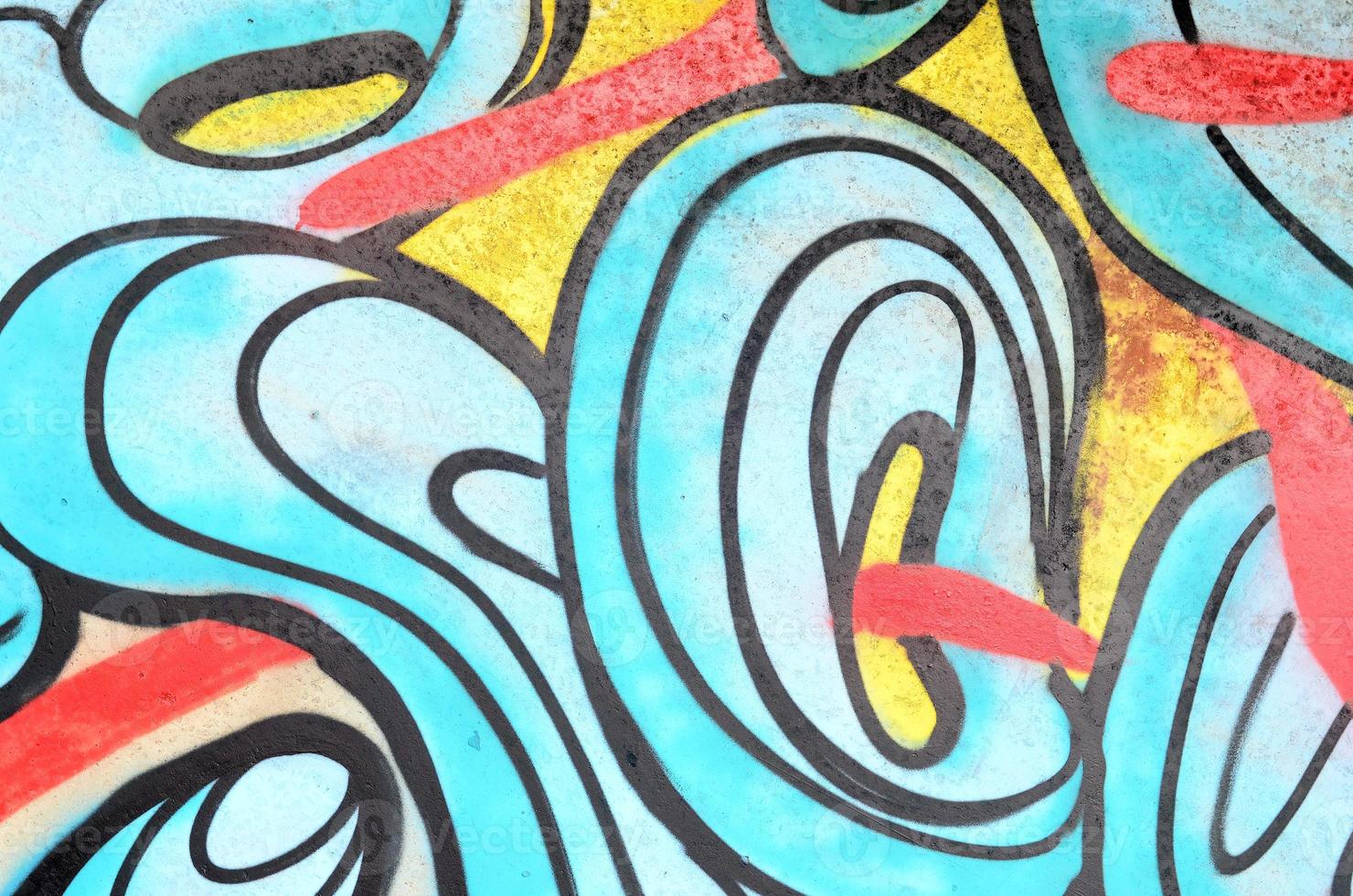 Background image with a graffiti pattern, which is applied to a concrete wall with aerosol paints photo