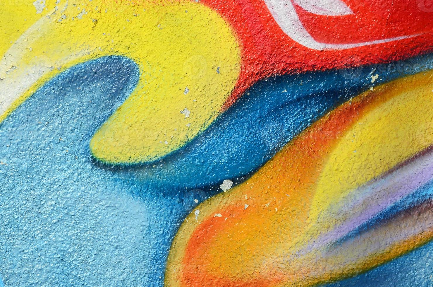Abstract graffiti paintings on the concrete wall. Background texture photo