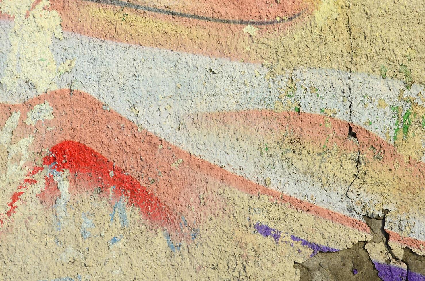 Abstract graffiti paintings on the concrete wall. Background texture photo