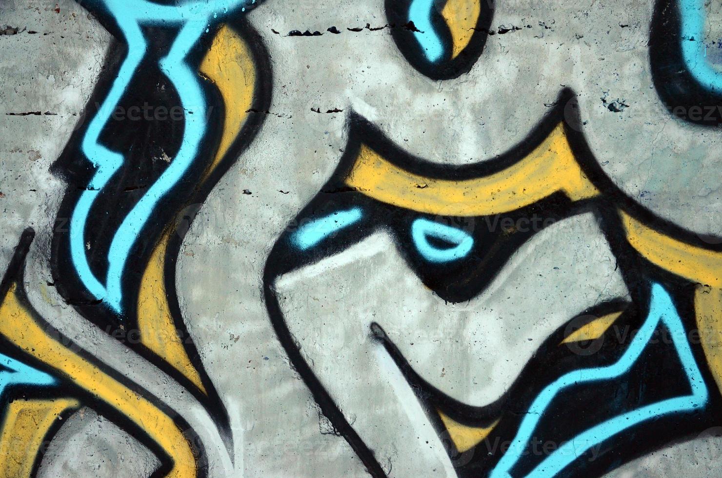 The old wall, painted in color graffiti drawing red aerosol paints. Background image on the theme of drawing graffiti and street art photo