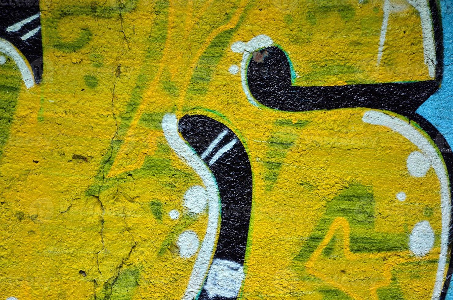 Art under ground. Beautiful street art graffiti style. The wall is decorated with abstract drawings house paint. Modern iconic urban culture of street youth. Abstract stylish picture on wall photo