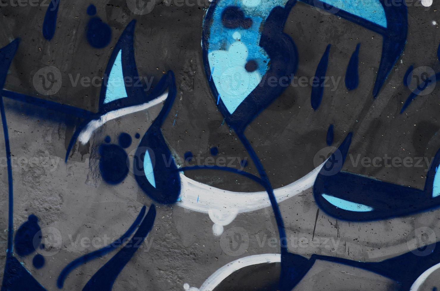 Background image of a concrete wall with a piece of abstract graffiti pattern. Street art, vandalism and youth hobbies photo