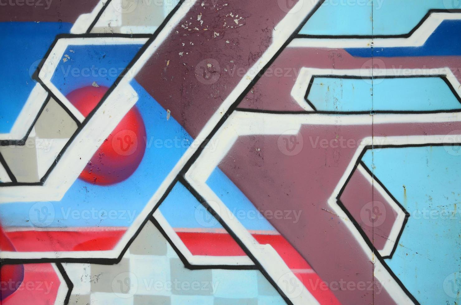 Fragment of graffiti drawings. The old wall decorated with paint stains in the style of street art culture. Colored background texture in cold tones photo