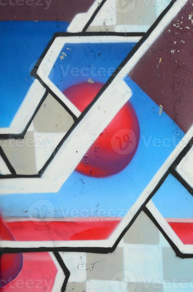 fragmento de dibujos de graffiti. la antigua muralla decorada con manchas de pintura al estilo de la cultura del arte callejero. textura de fondo coloreada en tonos fríos foto