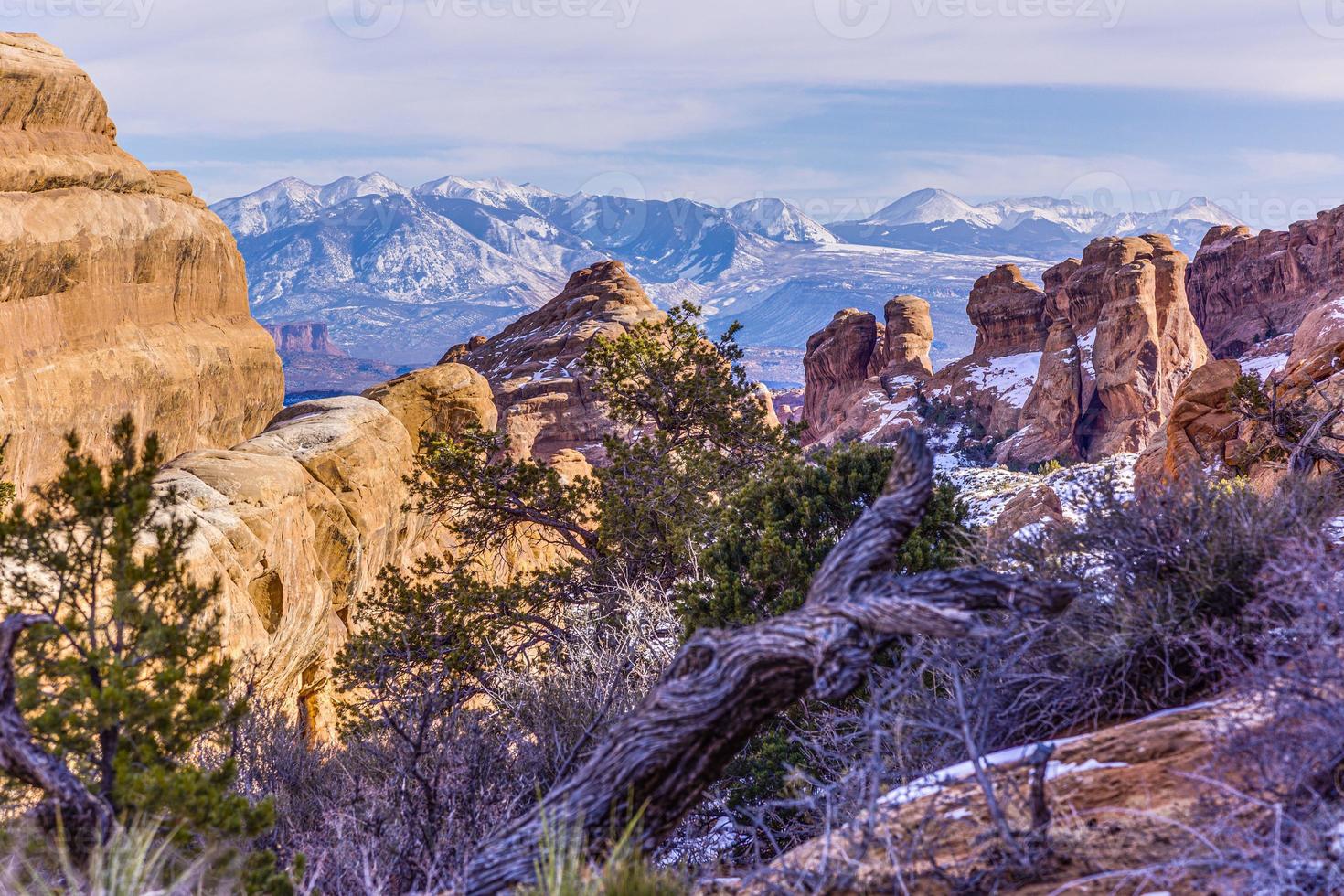 Panoramic picture of natural and geological wonders of Arches national park in Utah in winter photo