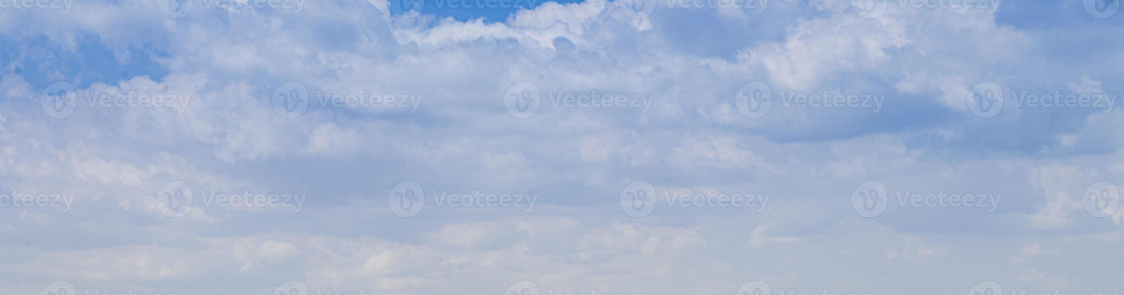 Image of a partly cloudy and partly clear sky during the day photo