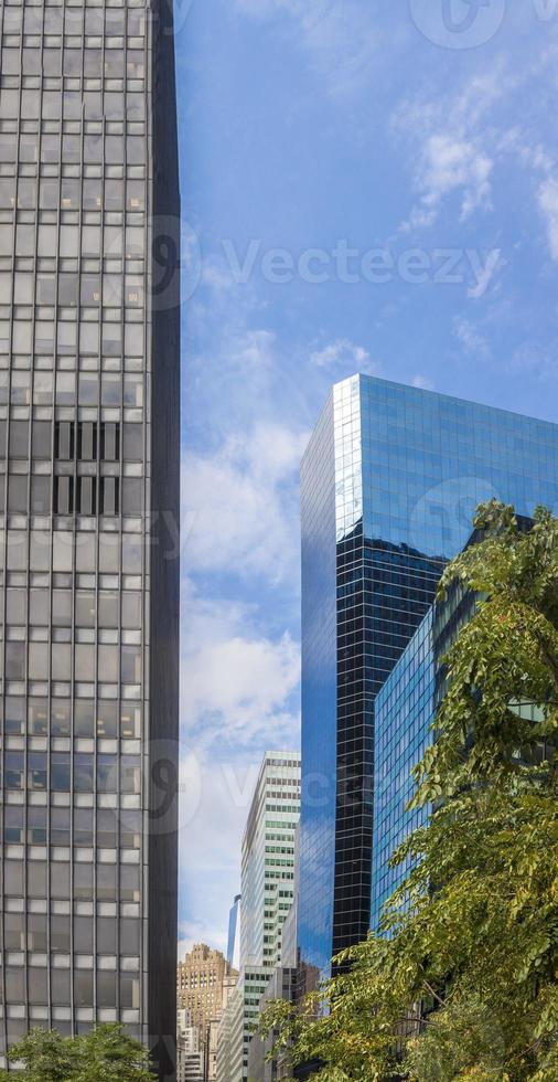 Skyscraper with glass facade in close up picture photo