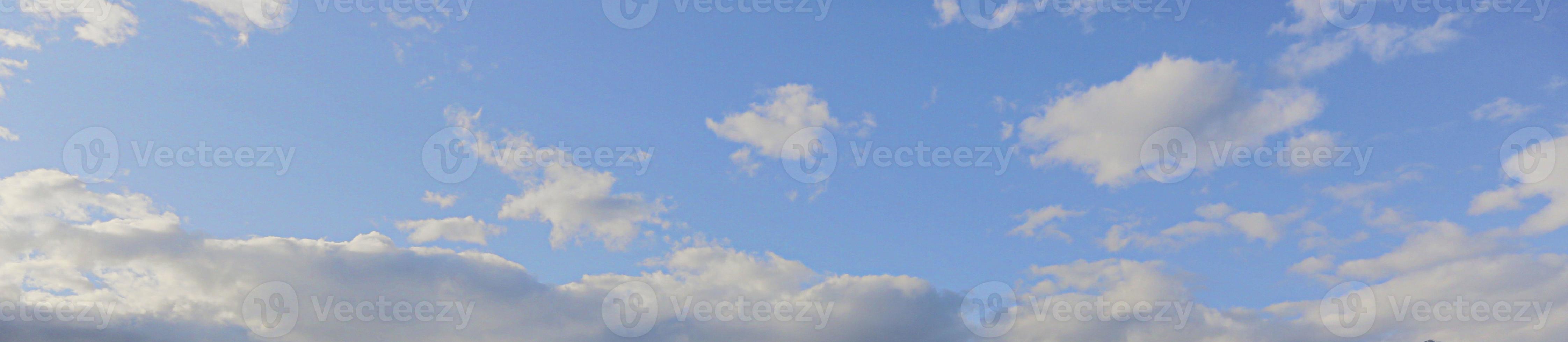 Image of a partly cloudy and partly clear sky during the day photo