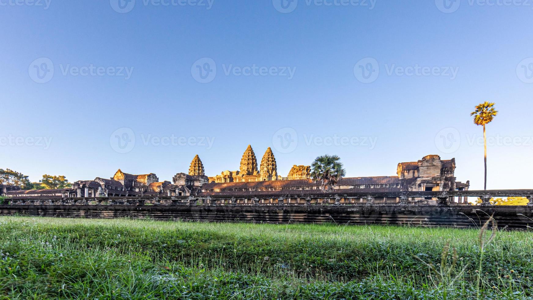 Mystical and famous ruins of Anchor Wat in Cambodia with no people in summer photo