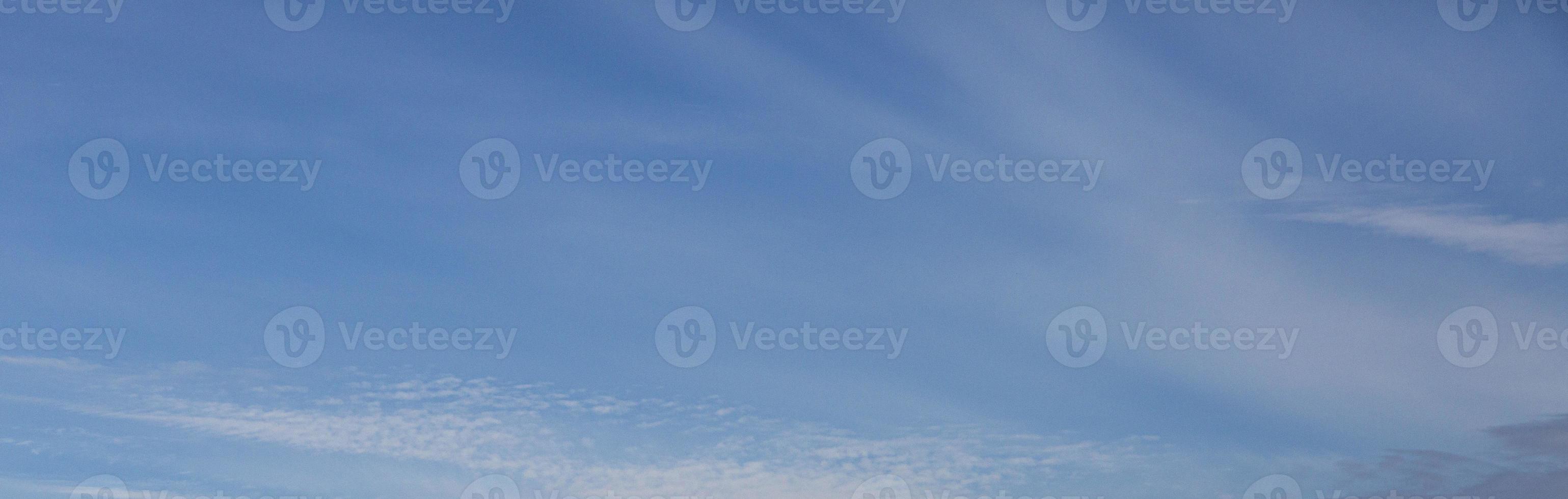 Image of a partly cloudy and partly clear sky during the day photo