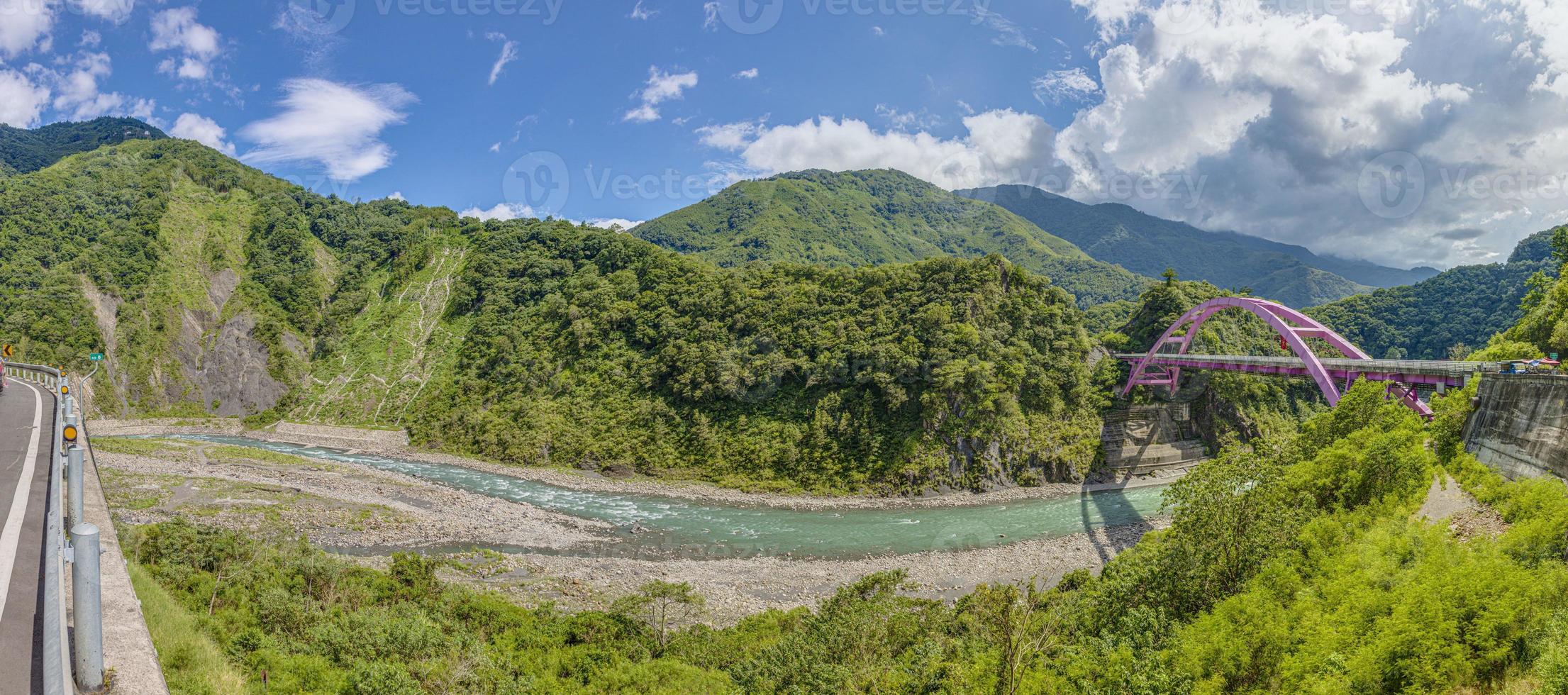 Panoramic picture on the Pink Arch Bridge in the mountains of Taiwan in summer photo