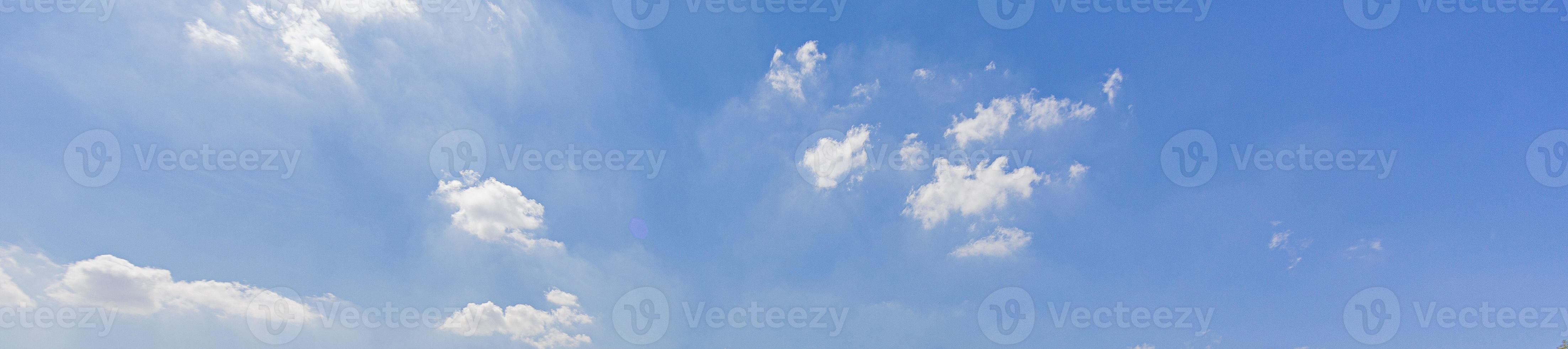 Image of a partly cloudy and partly clear sky during the day photo