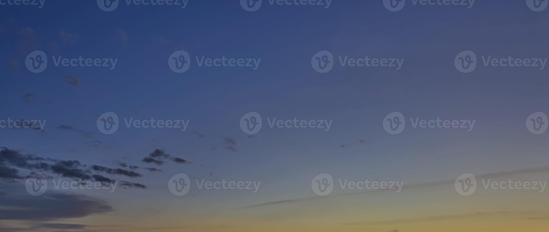 Dramatic colorful sky with afterglow and illuminated clouds photo
