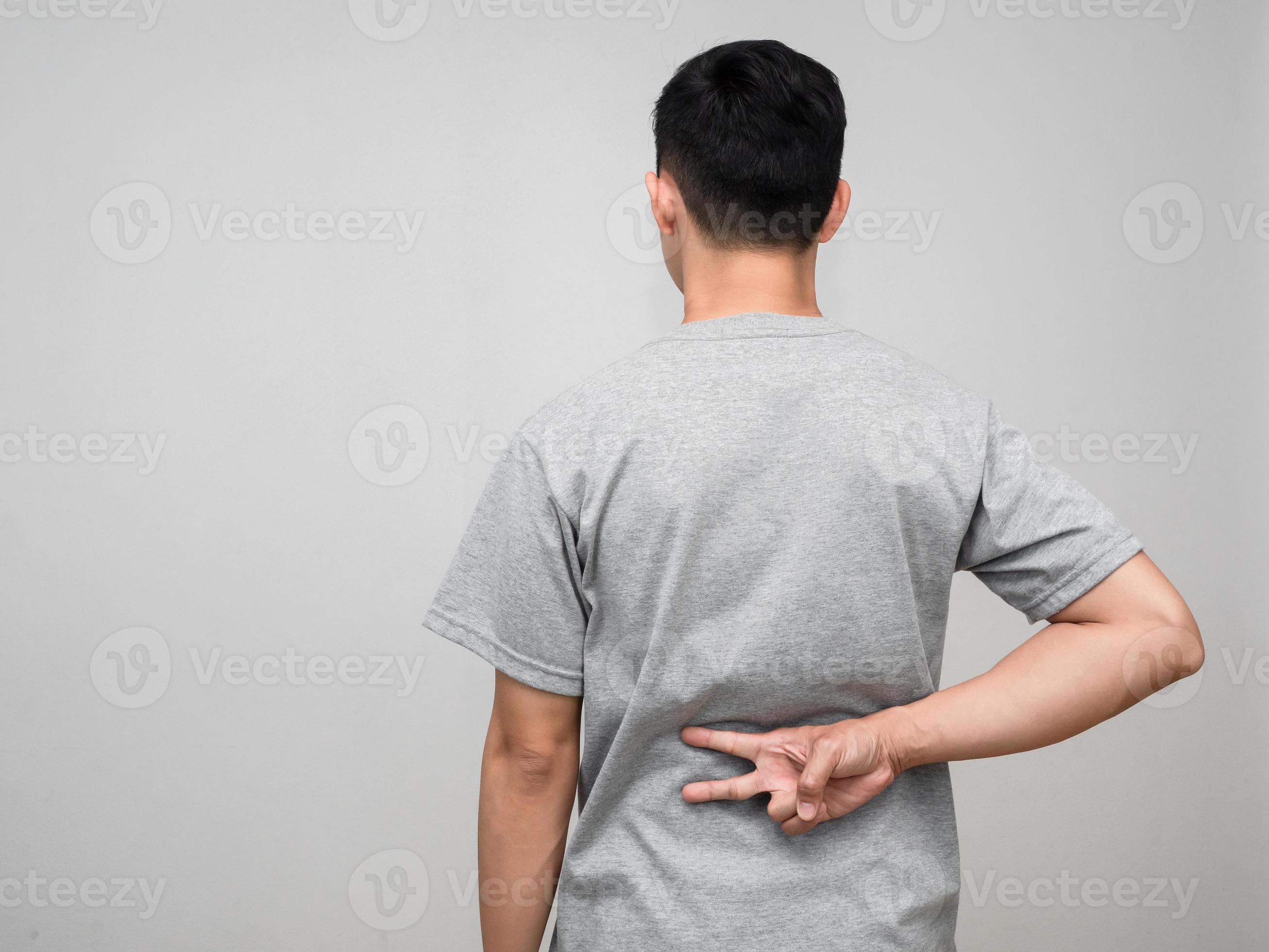 Man standing turn back show hand two finger for fight isolated 17069557