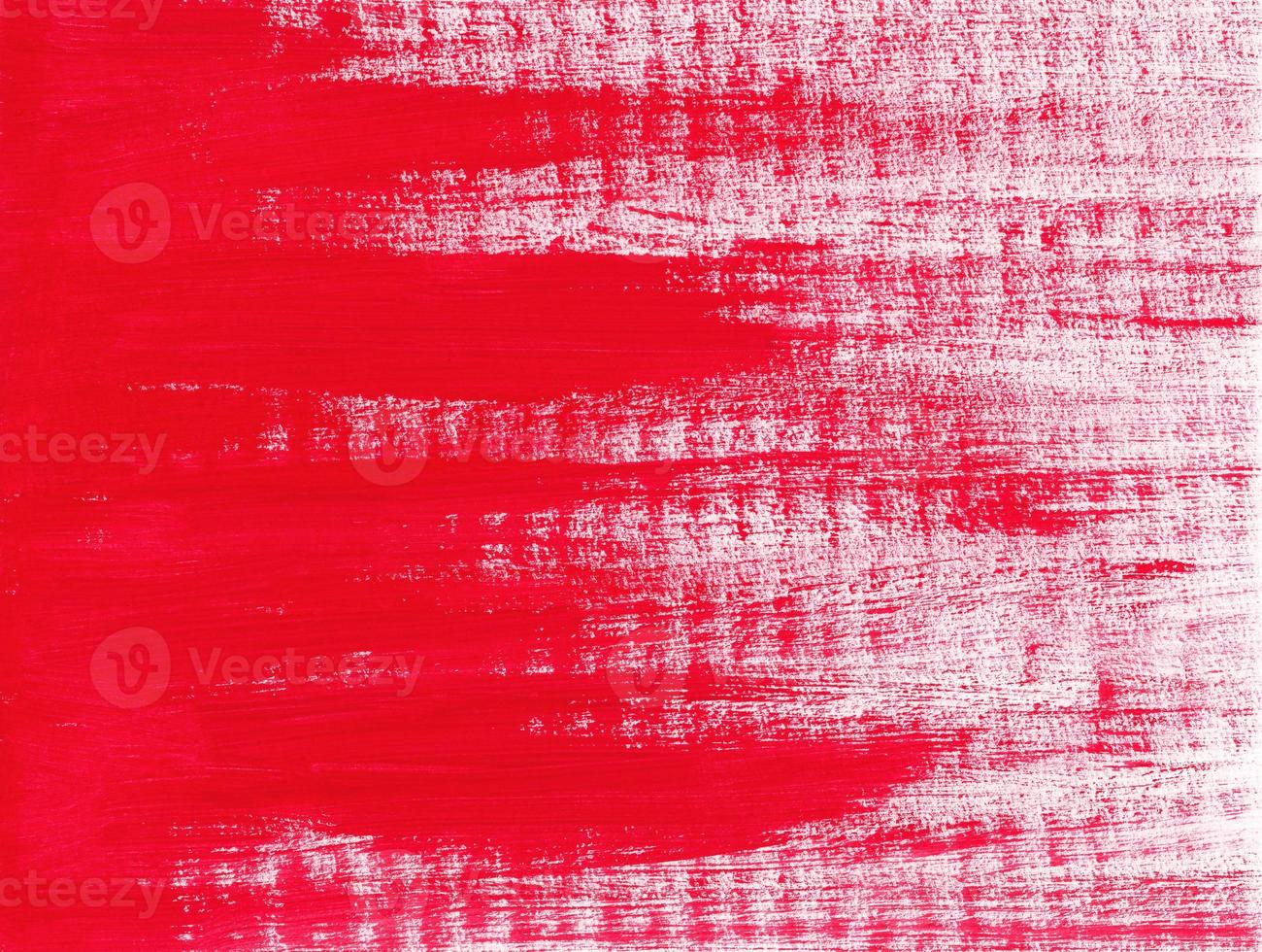Abstract acrylic red paint texture on horizontal canvas. From left to right brushstrokes of red paint. Artistic background with place for text. photo