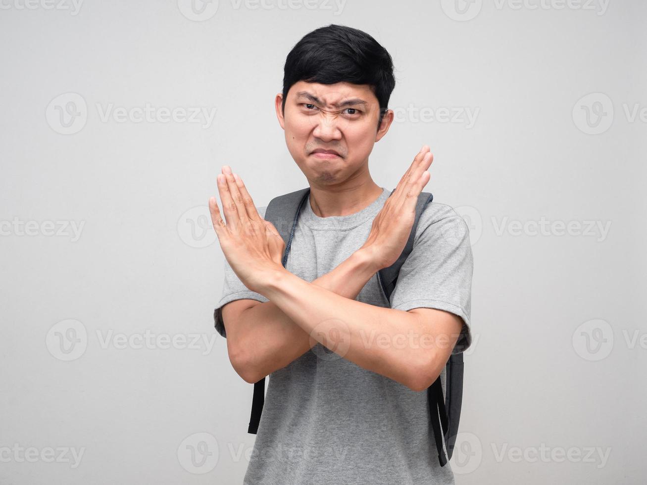 School boy with backpack cross arms disagree photo