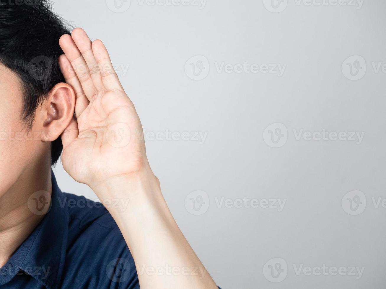 Close-up man gesture listening isolated photo