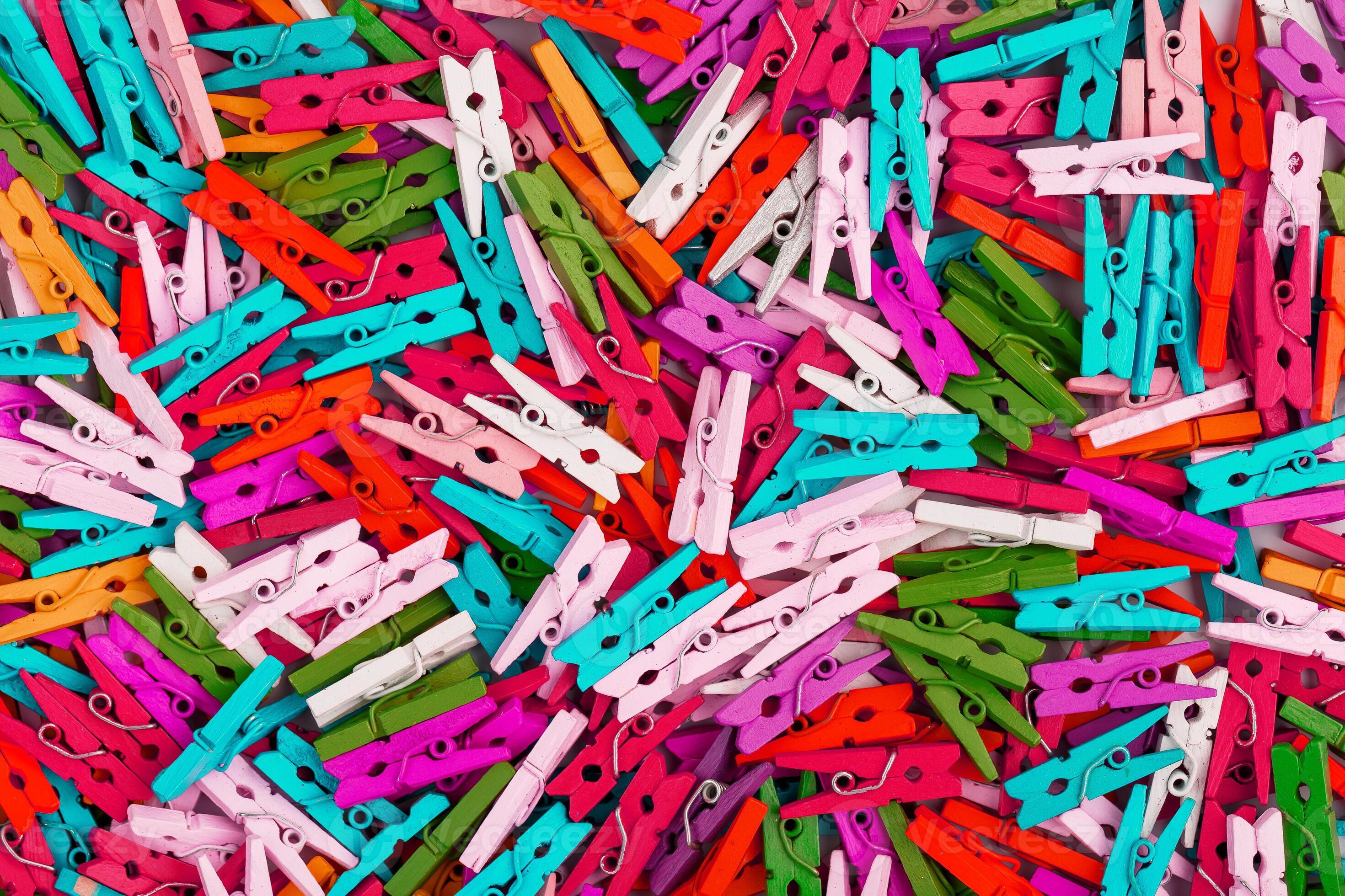 Multicolored wooden clothespins as a fullscreen texture and