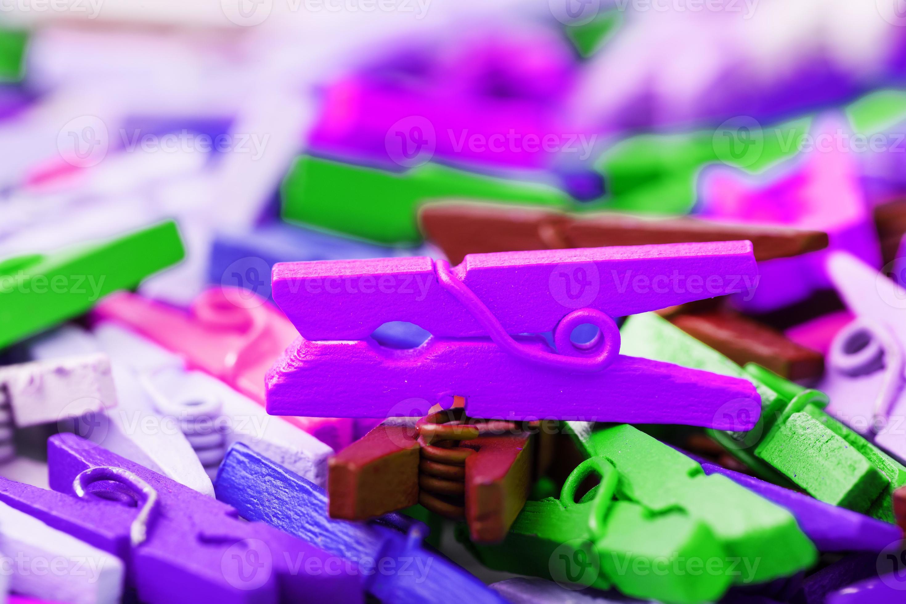 Small Clothespins of different colors close-up as a texture and background  in full screen. 17072240 Stock Photo at Vecteezy