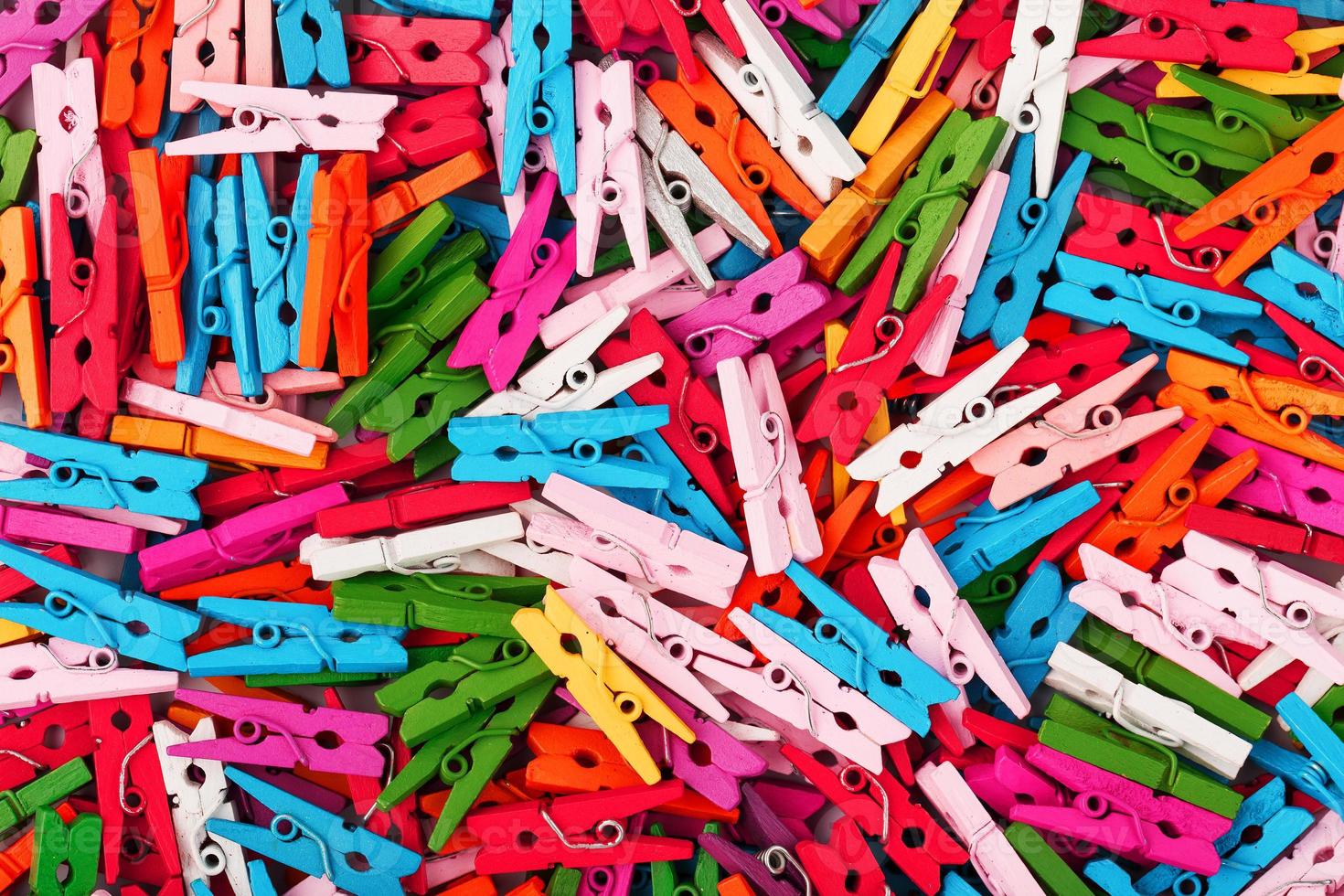 Small Clothespins of different colors close-up as a texture and background  in full screen. 17072240 Stock Photo at Vecteezy