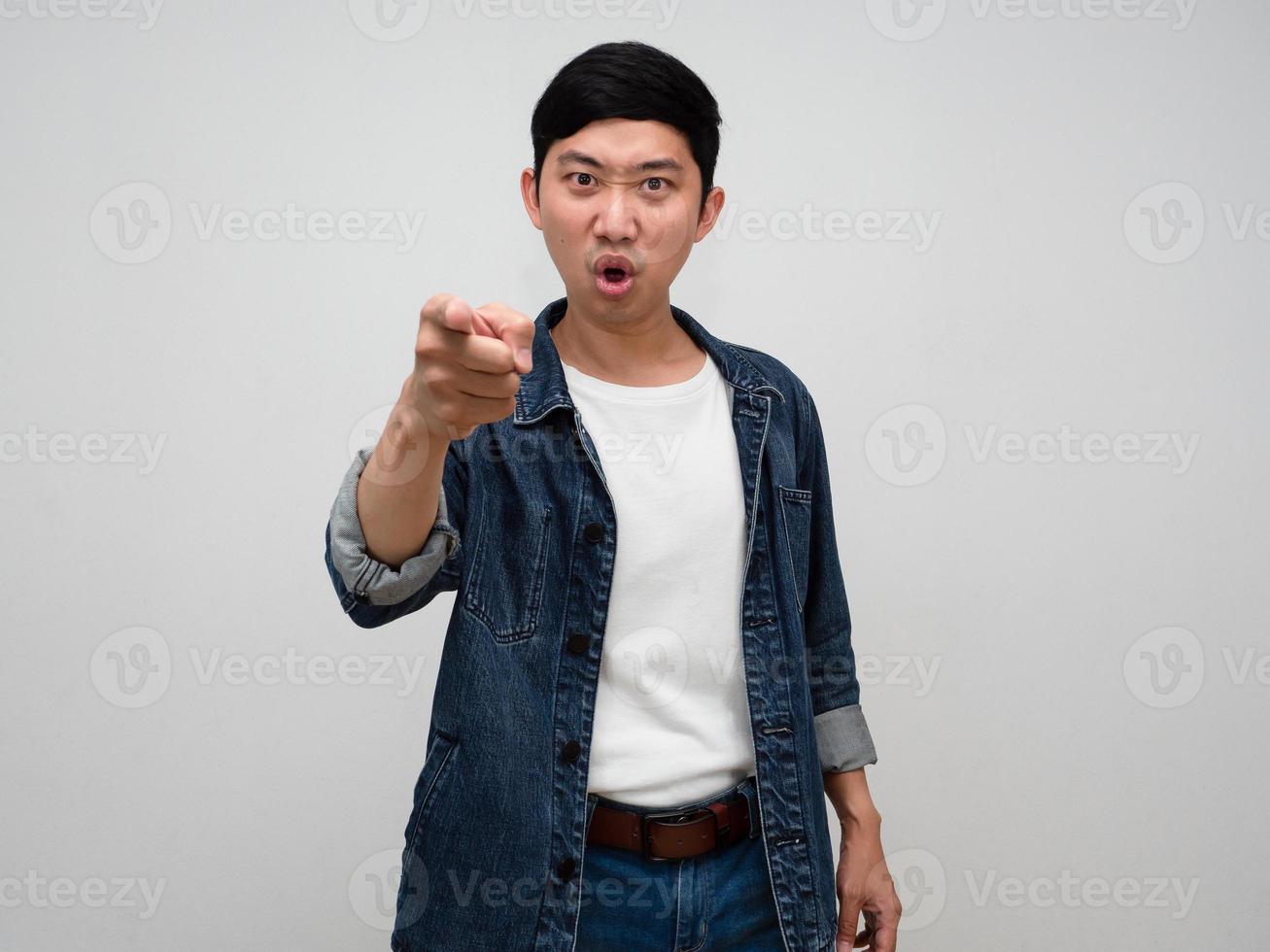 Asian man jeans shirt gesture point finger for choosing you isolated photo