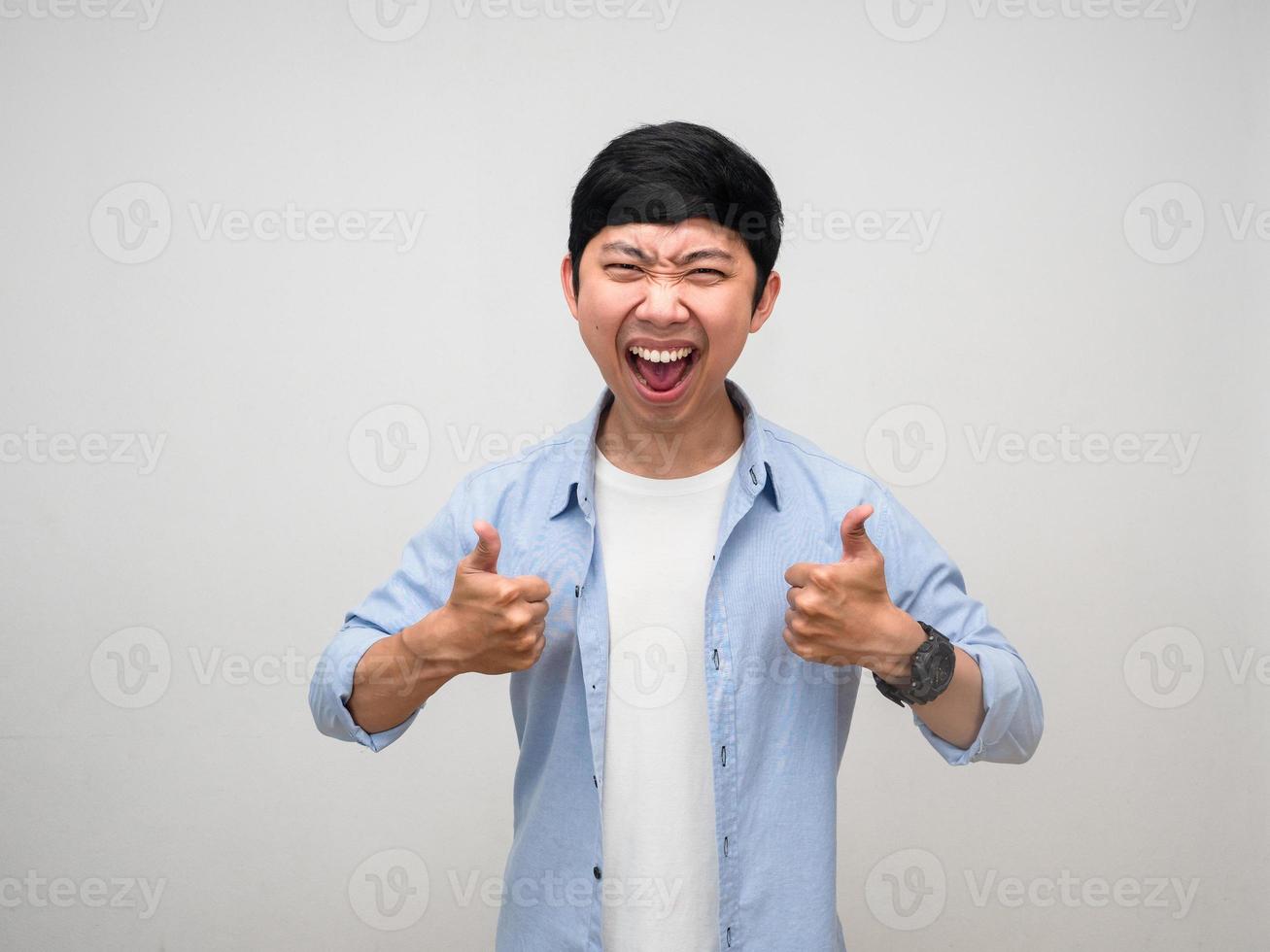 Cheerful young man satisfied happiness show thumb up isolated photo