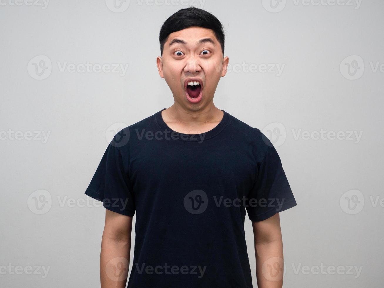 Asian man gesture shocked at his face,Man amazed isolated photo