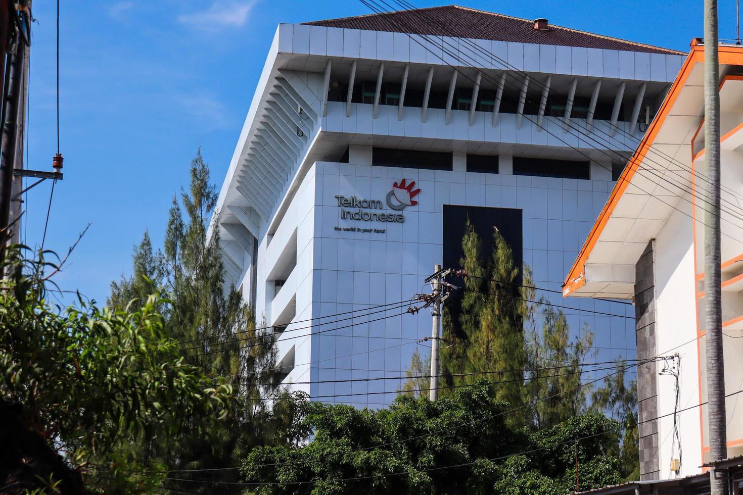 Semarang, Indonesia, December 2022. Office building of PT. Telkom, on Jl. Pahlawan Pleburan, Kec. South Semarang, Semarang City. PT Telkom is a state-owned telecommunication company in Indonesia. photo